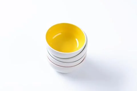 Stack of round two tone bowls Foto stock