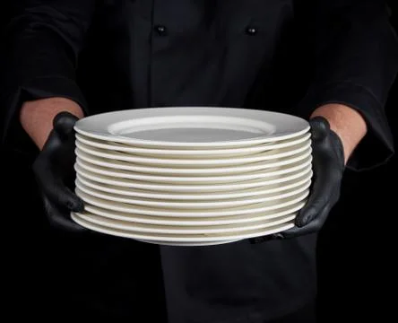 Stack of round white empty plates Stock-Fotos