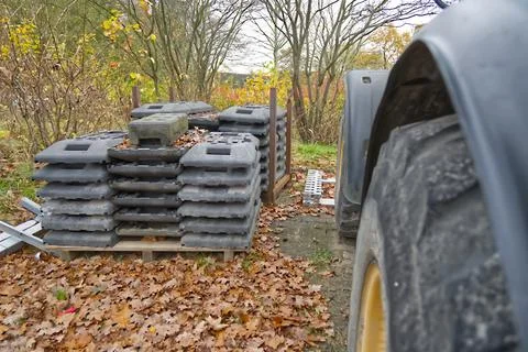 Stack of Rubber Mats in Autumn Landscape Stock Photos