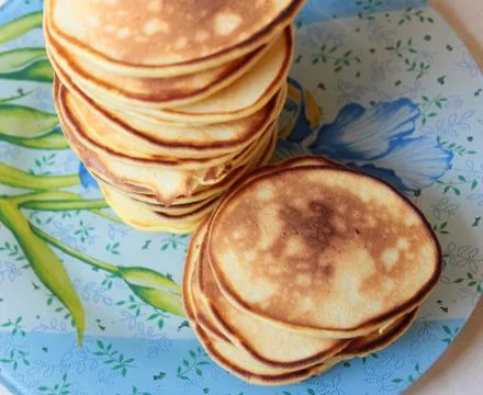 A stack of ruddy pancakes Stock Photos