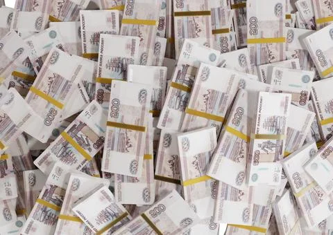 Stack Russian cash or banknotes of Rusia rubles scattered on a white backgrou Illustrazione stock