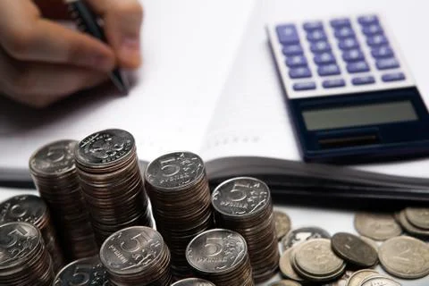 Stack of Russian coins on the background of working as an accountant Stock Photos