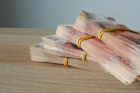 Stack of Russian rubles banknotes on wooden table, close up Stock Photos