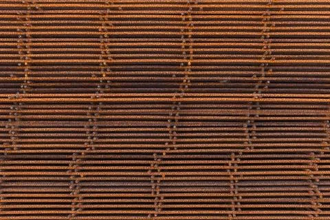 Stack of rusted reinforcing elements Foto stock