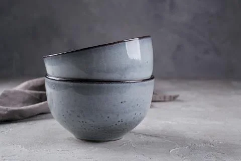 Stack of rustic style handcraft bowls in neutral tones Stock Photos
