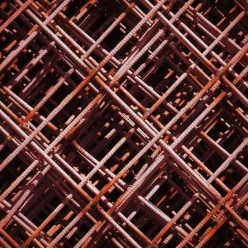 Stack of rusty rebar grids at the construction site Stock Photos