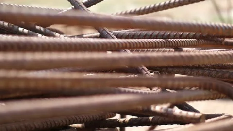 Stack of Rusty Reinforcement Rods Laying On Ground. Close Up, Handheld Stock Footage 165186891