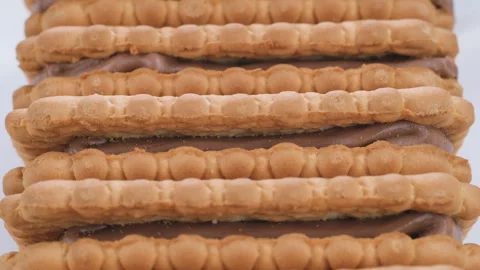 Stack of sandwich biscuits with chocolate. Macro details. Slider shot. Stock Footage 296541746