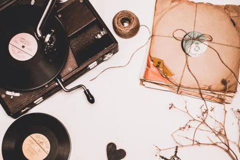 Stack of scratched dusty old vinyl records tied with rope Stock Photos