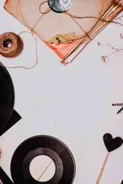 Stack of scratched dusty old vinyl records tied with rope Stock Photos