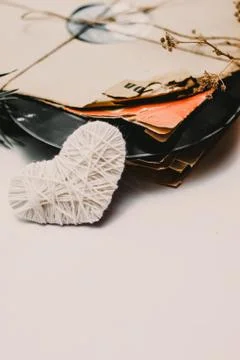 Stack of scratched dusty old vinyl records tied with rope Stock Photos