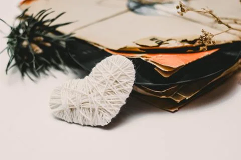Stack of scratched dusty old vinyl records tied with rope Stock Photos