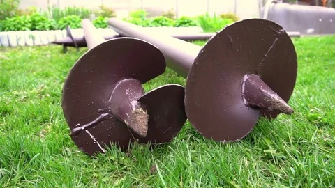 Stack of screw piles for house foundation, closeup. Nobody Stock Footage 79086132