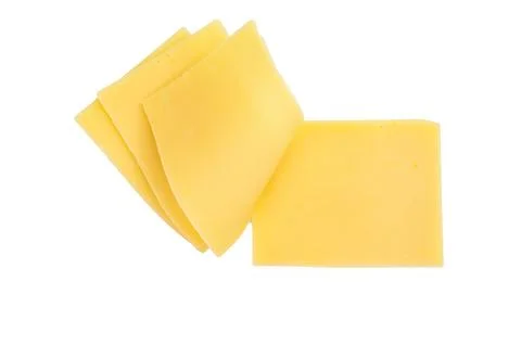 Stack of semi hard yellow cheese slices on clean white background, Gouda Ed.. Stock Photos