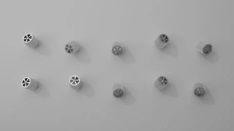 Stack of several gears on the bright flat background. Simple mechanical theme Illustrazione stock