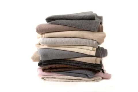 A stack of shawl wool fabric on a white background Stock Photos
