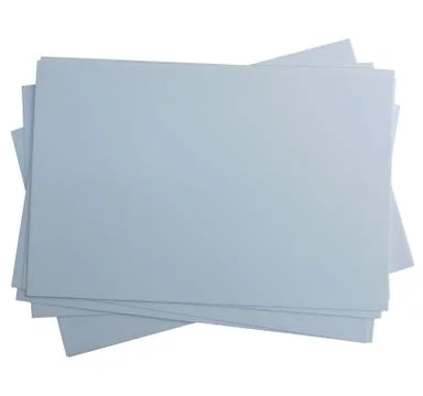 A stack of sheets of gray paper isolated on a white background.Texture or Stock Photos