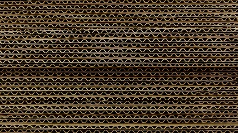 A stack of sheets of industrial packaging board. Cardboard Sheets for Boxes Stock-Footage 129488666