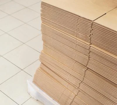 A stack of sheets of industrial packaging board. Cardboard Sheets for Boxes Stock Photos