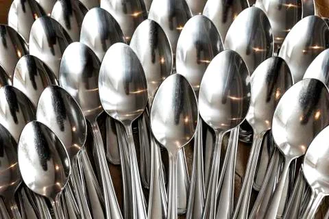 Stack of shining spoon, Abstract background of  sparkling bronze spoon, kitch Stock Photos