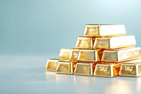 Stack of shiny gold bars on light blue background symbolizing wealth, investm Stock Photos