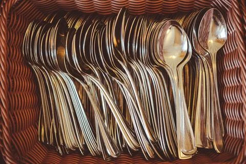 Stack of shiny metal spoons Stock Photos