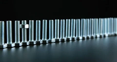 Stack of shiny nuts rotating on a black background Stock-Footage 107079176