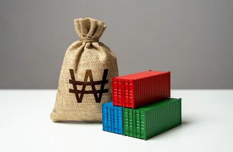 Stack of shipping containers and south korean won money bag. Trade, economics Stock Photos