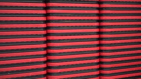 A stack of shopper baskets in a supermarket. Red mall trolley Video stock 119602235