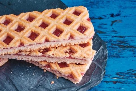 Stack of shortbread cookie with red currant jam. Stock Photos