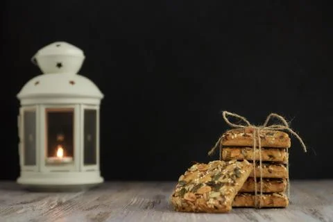 A stack of shortbread cookies with different types of nuts to a delicious cof Stock Photos