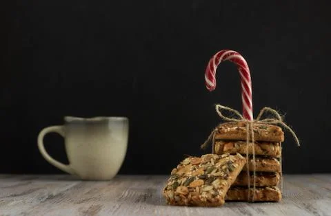 A stack of shortbread cookies with different types of nuts to a delicious cof Stock Photos