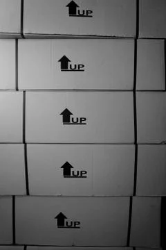 Stack of this side up symbol prin ton the carton boxes Stock Photos