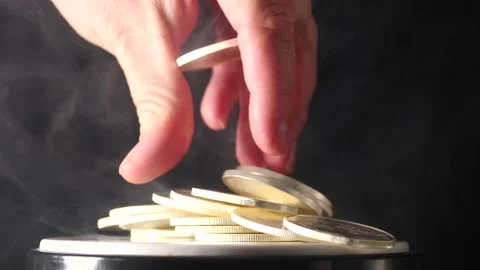 Stack of silver being flipped through by hand and falling onto the ground close  Stock Footage 207649295