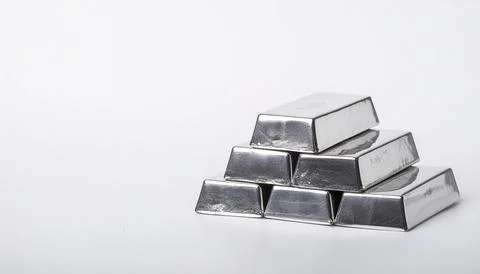 Stack of silver bullion bars. The flat, rectangular shape of silver bars ma.. Stock Photos