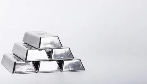 Stack of silver bullion bars. The flat, rectangular shape of silver bars ma.. Stock Photos