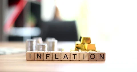 Stack of silver coins with gold bars and text inflation Stock Footage 233728916