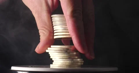 Stack of silver coins man flipping through them as they are falling isolated on  Stock Footage 207649952