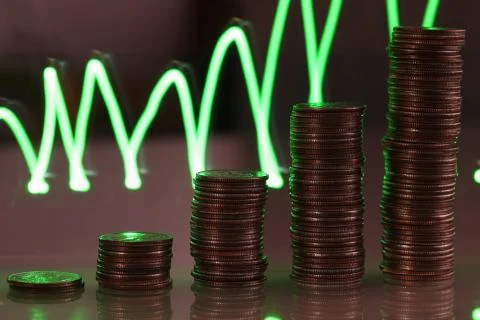 Stack of silver coins presentation at table going up Stock Photos
