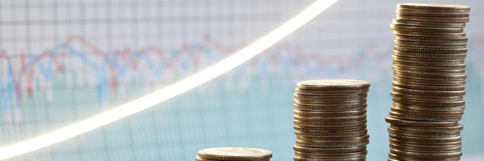 Stack of silver coins presentation at table going up Stock Photos