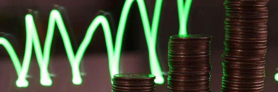 Stack of silver coins presentation at table going up Stock Photos