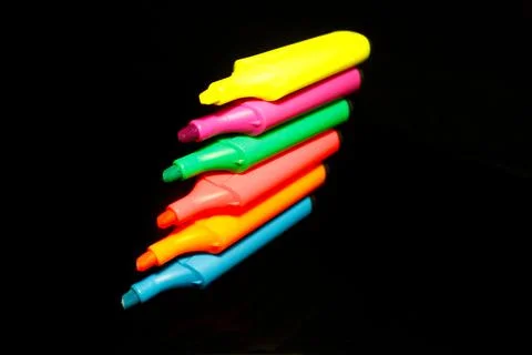 A stack of six marker pen isolated on black Stock Photos