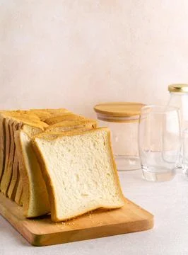 Stack of slice bread isolated on bright background with negative space Stock Photos
