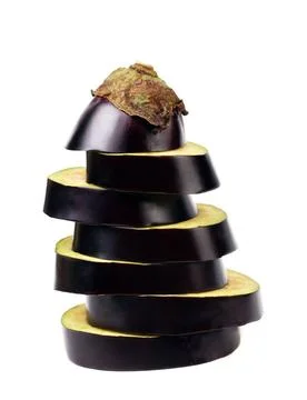  Stack of sliced eggplant. Stack of sliced eggplant. Isolated on a white b... Foto stock