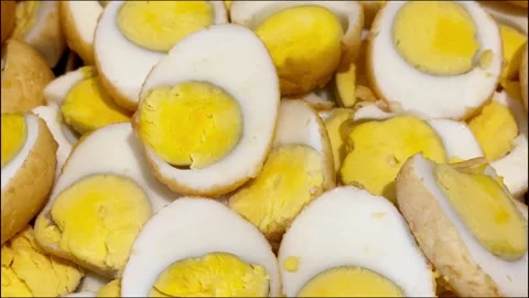 A stack of sliced ​​hard-boiled eggs Stock Footage 345354685