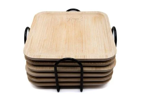 Stack of sliced whole wheat bread loaves on wooden board. Freshly baked Stock Photos