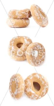 Stack of small cakes with hole isolated over the white background Stock Photos
