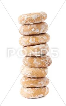 Stack of small cakes with hole isolated over the white background Stock Photos