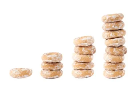 Stack of small cakes with hole isolated over the white background Stock Photos