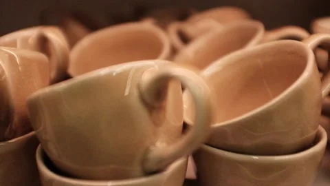 Stack of small minimalist aesthetic ceramic cups for coffee. Stock Footage 320971818